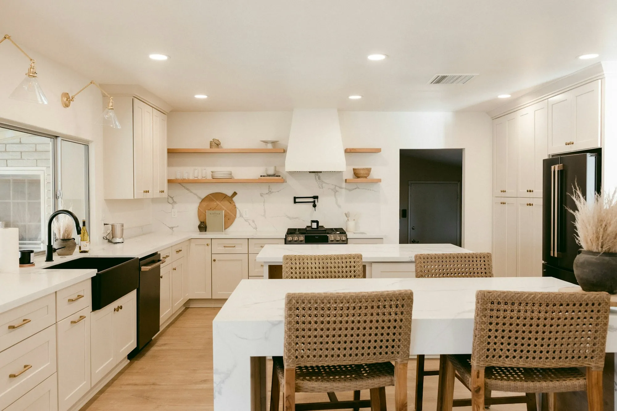 Modern kitchen with white cabinets and open shelving
